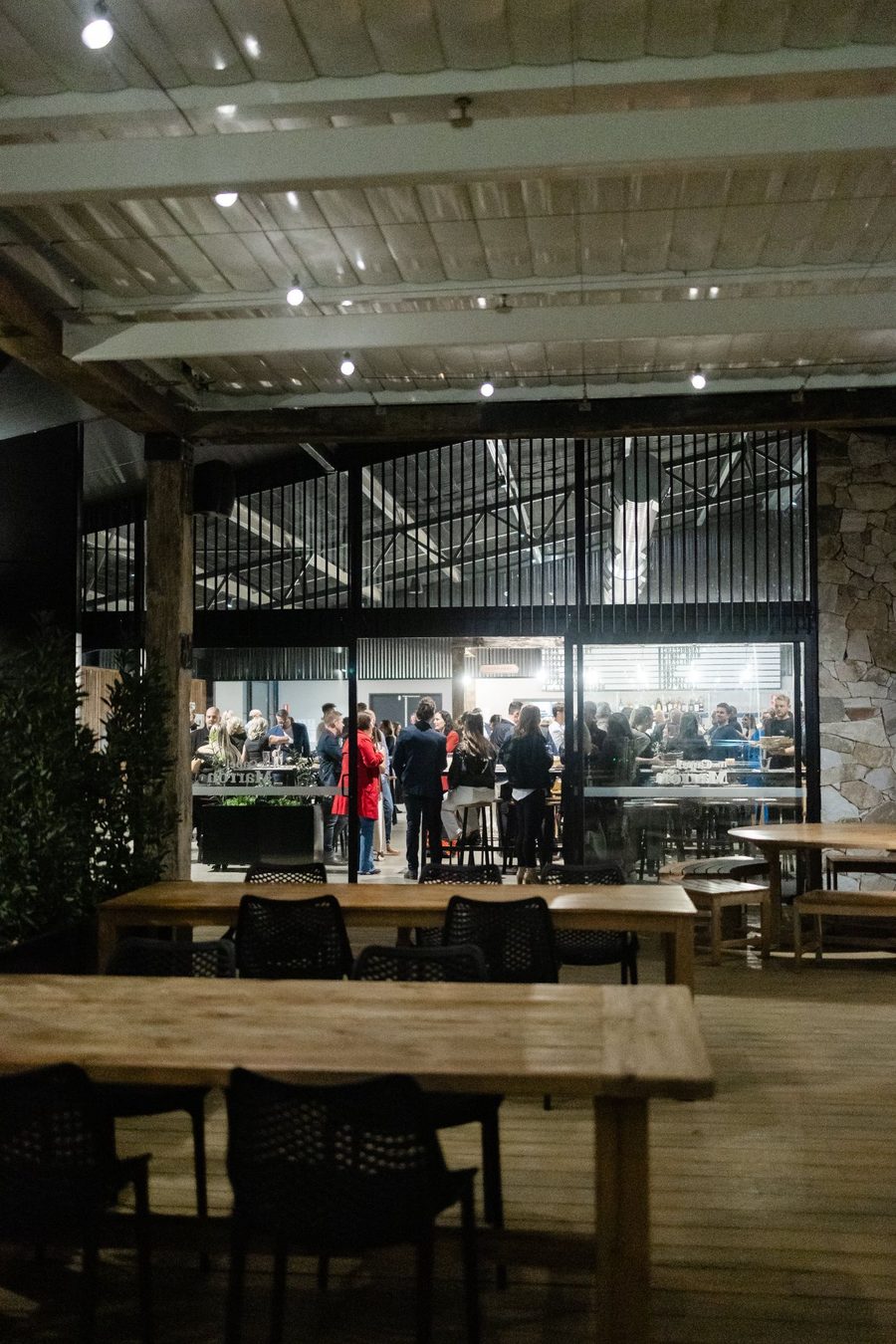 Guests gathered in the pavilion at night