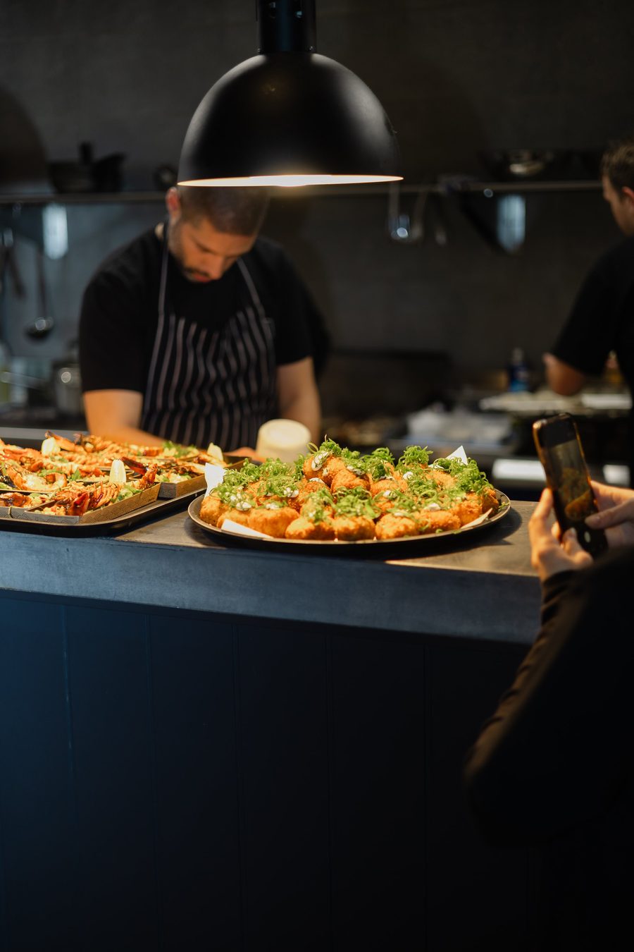 Chef plating at the pass